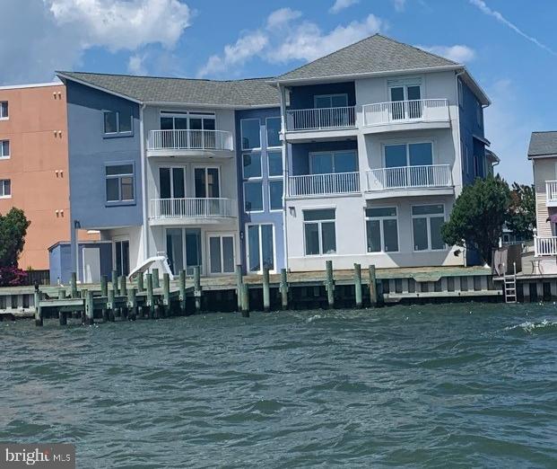 view of property with a water view