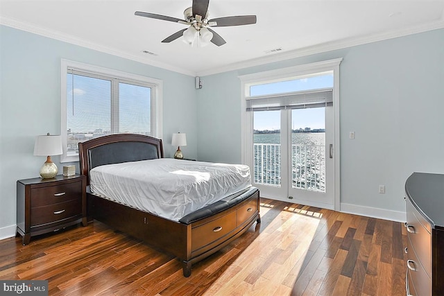 bedroom featuring access to outside, ceiling fan, crown molding, dark wood-type flooring, and a water view