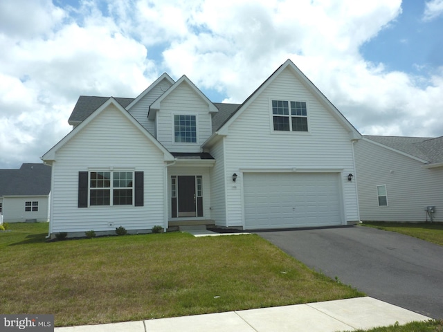 view of front facade with a front lawn and a garage