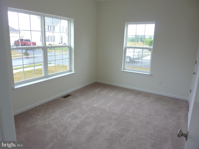 view of carpeted spare room