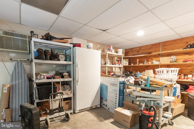 storage room featuring a wall mounted air conditioner