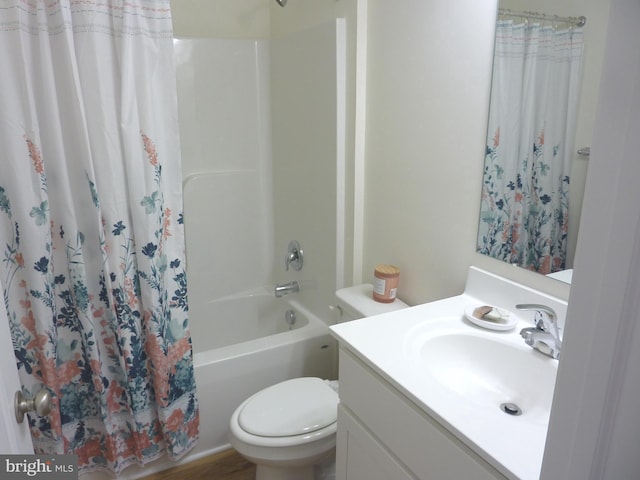 full bathroom featuring vanity, wood-type flooring, toilet, and shower / bathtub combination with curtain