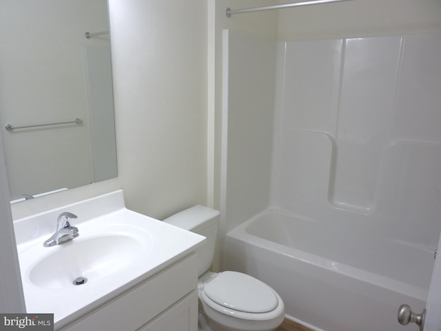 full bathroom featuring toilet, shower / washtub combination, and vanity