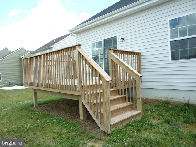 deck featuring a lawn