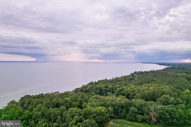 aerial view at dusk with a water view