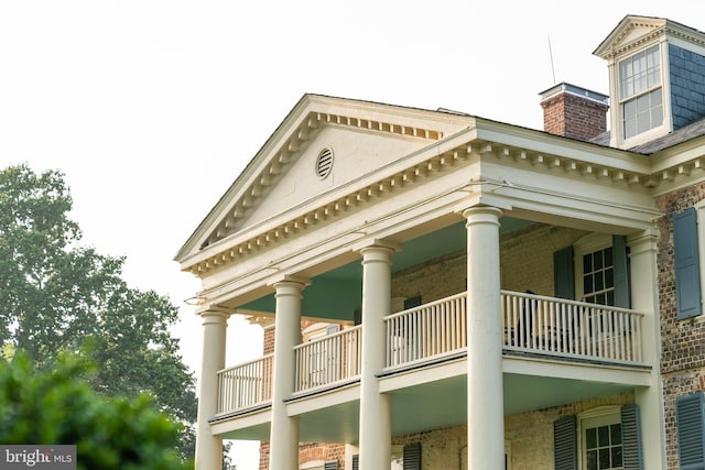 view of home's exterior featuring a balcony