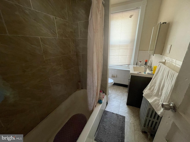 full bathroom featuring tile walls, tile floors, shower / tub combo, toilet, and vanity