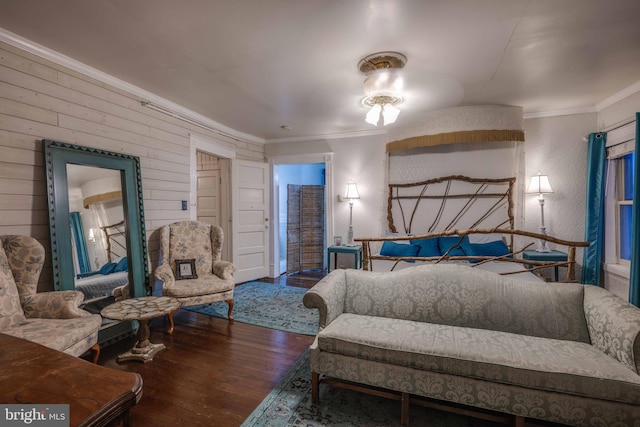 bedroom with ornamental molding and dark hardwood / wood-style flooring