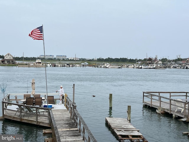 view of dock with a water view