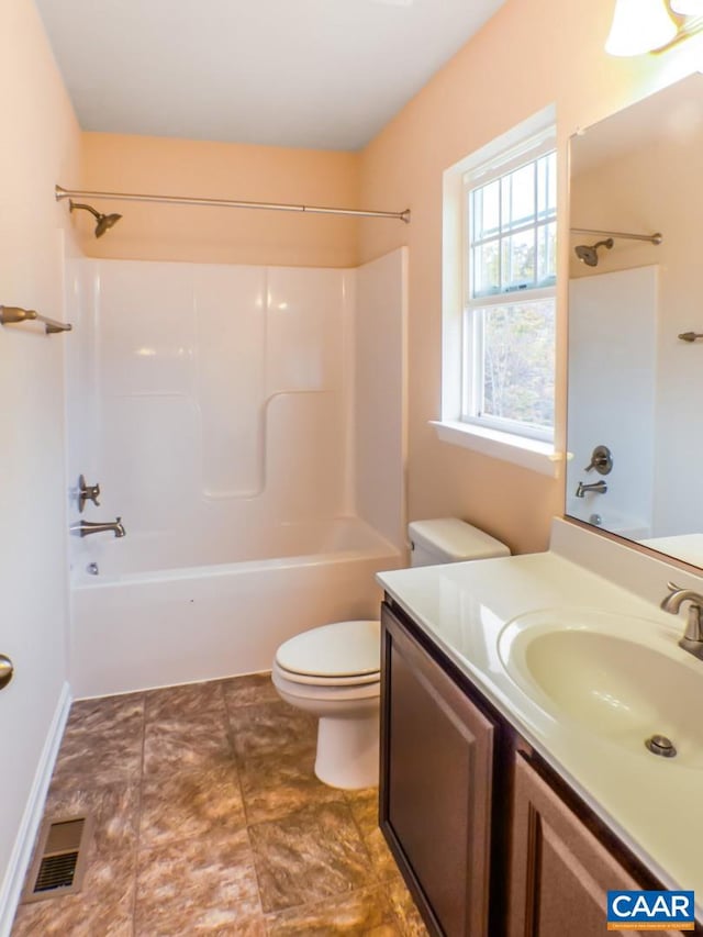 full bathroom with vanity with extensive cabinet space, shower / washtub combination, and toilet