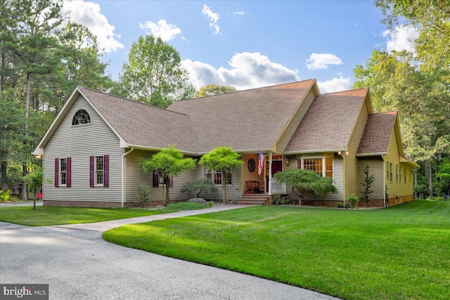 view of front of home with a front lawn