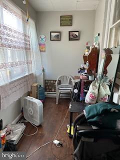 misc room with dark wood-type flooring