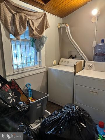 laundry area with washer hookup, washing machine and clothes dryer, and wood ceiling