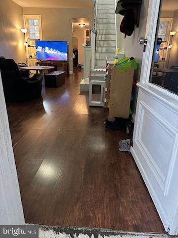 hallway featuring dark wood-type flooring