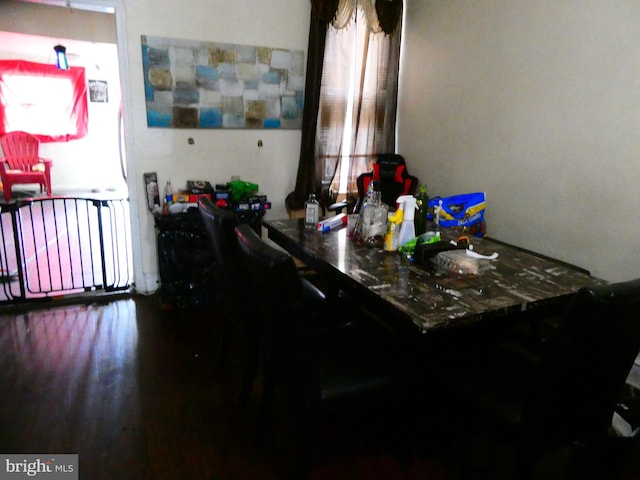 dining room with hardwood / wood-style floors