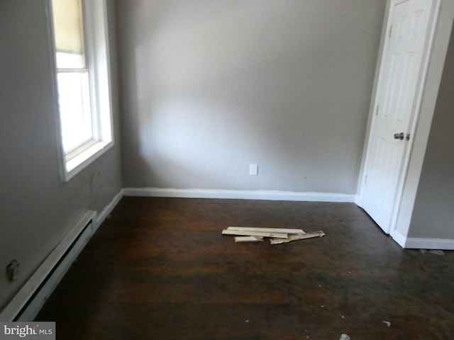 spare room with baseboard heating