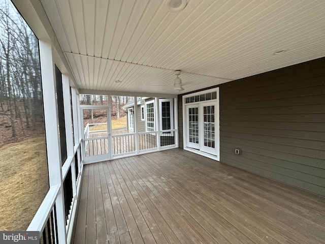 unfurnished sunroom featuring wood ceiling