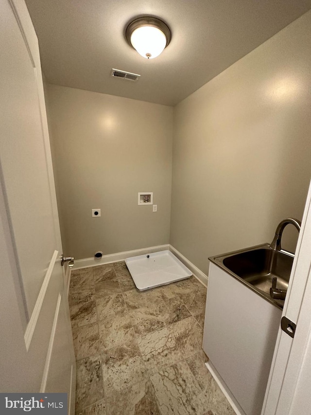 washroom with baseboards, visible vents, hookup for an electric dryer, laundry area, and washer hookup