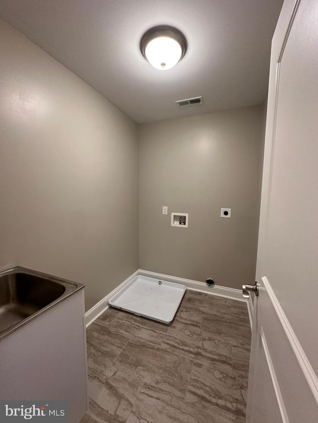 laundry room with visible vents, baseboards, washer hookup, laundry area, and electric dryer hookup