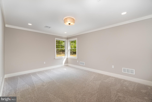 unfurnished room featuring carpet flooring and ornamental molding