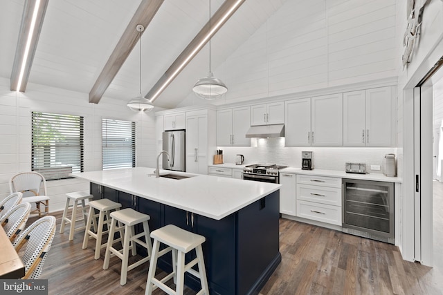 kitchen with high vaulted ceiling, beverage cooler, white cabinets, and dark hardwood / wood-style flooring