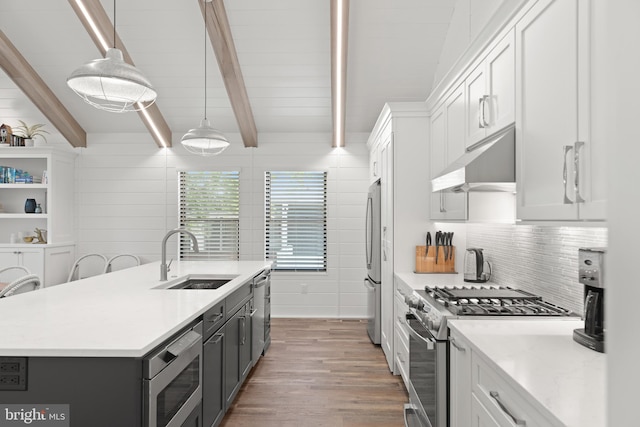 kitchen featuring white cabinetry and appliances with stainless steel finishes