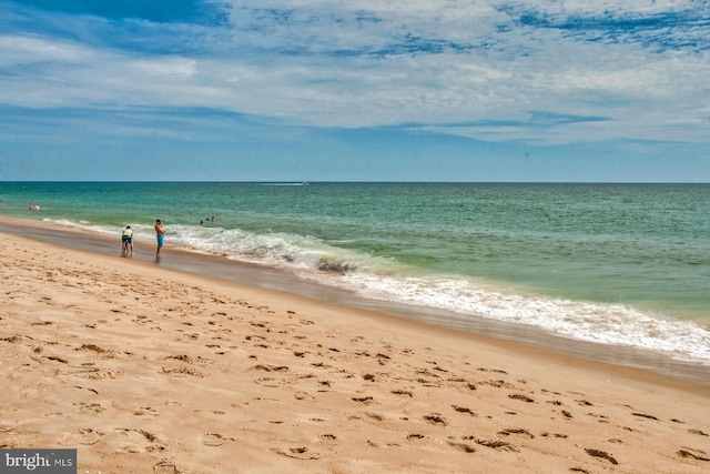 property view of water featuring a view of the beach