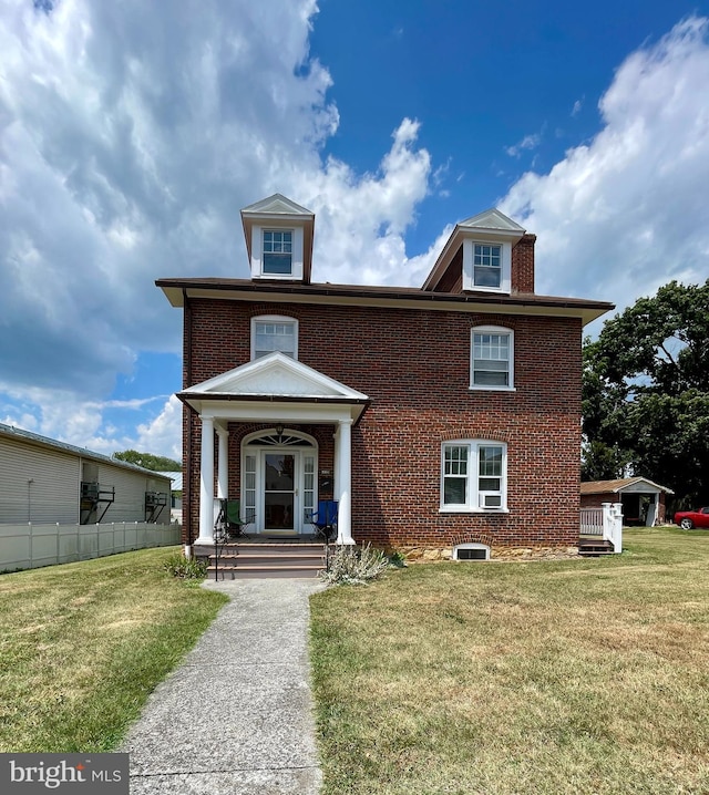 view of front facade with a front yard