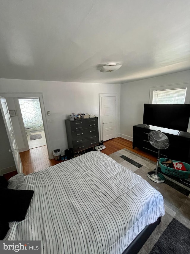 bedroom featuring hardwood / wood-style floors