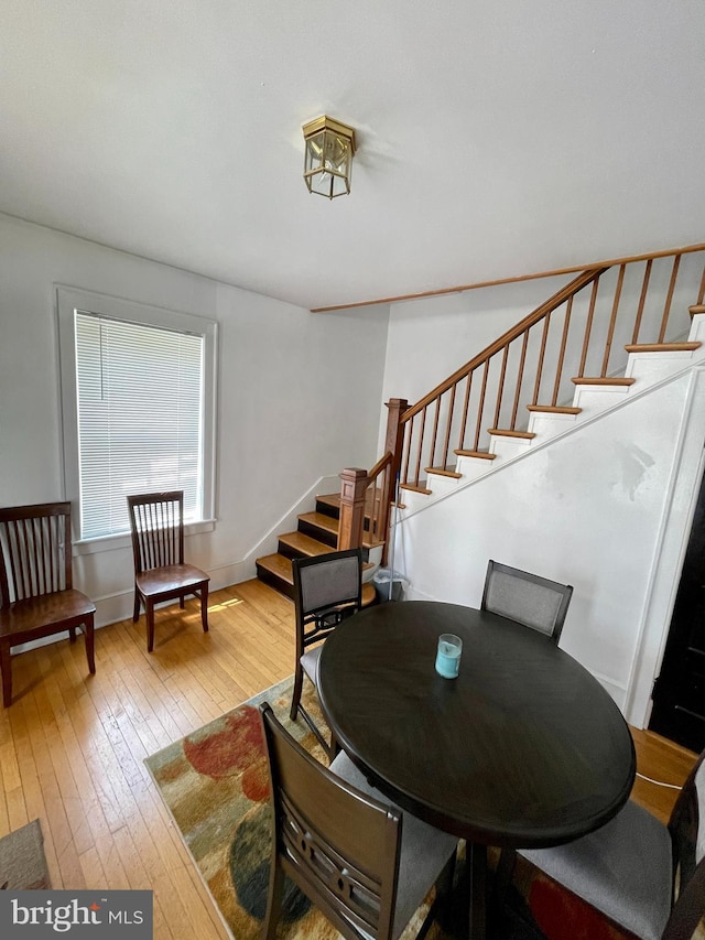 dining area with light wood-type flooring