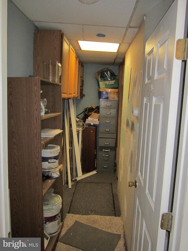 interior space featuring a paneled ceiling