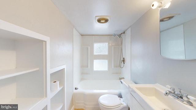 full bathroom with vanity, shower / tub combination, and toilet