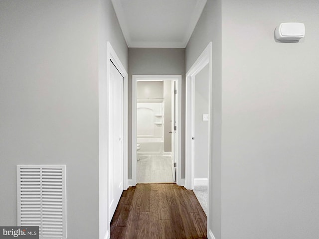 hall with dark hardwood / wood-style flooring