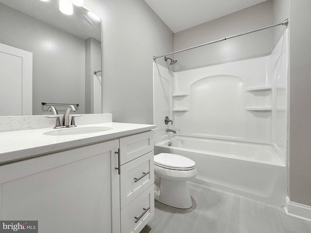 full bathroom featuring  shower combination, tile floors, oversized vanity, and toilet