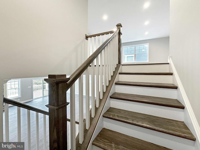 stairway featuring hardwood / wood-style flooring