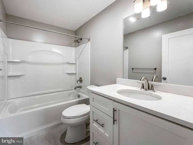 full bathroom featuring tile floors, toilet, vanity, and bathtub / shower combination