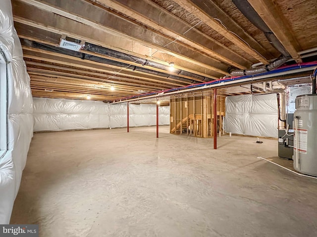 basement featuring water heater