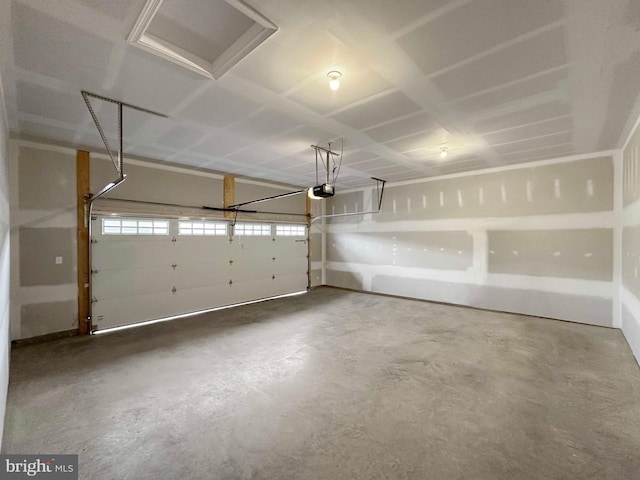 garage featuring a garage door opener