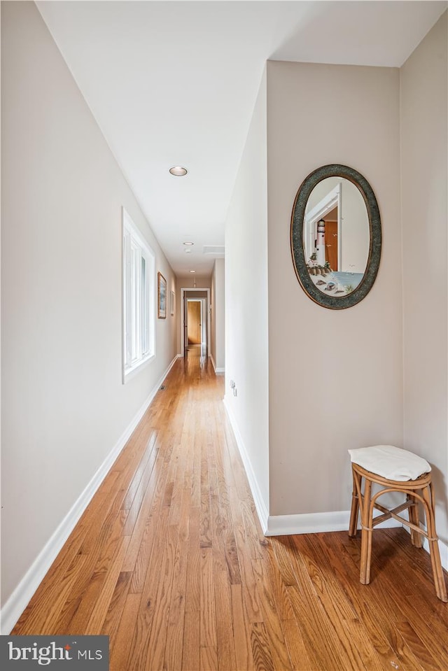 hall featuring light hardwood / wood-style floors