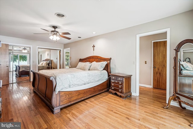 bedroom featuring ceiling fan and light wood-type flooring