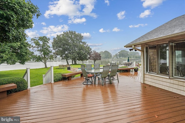 deck featuring a lawn