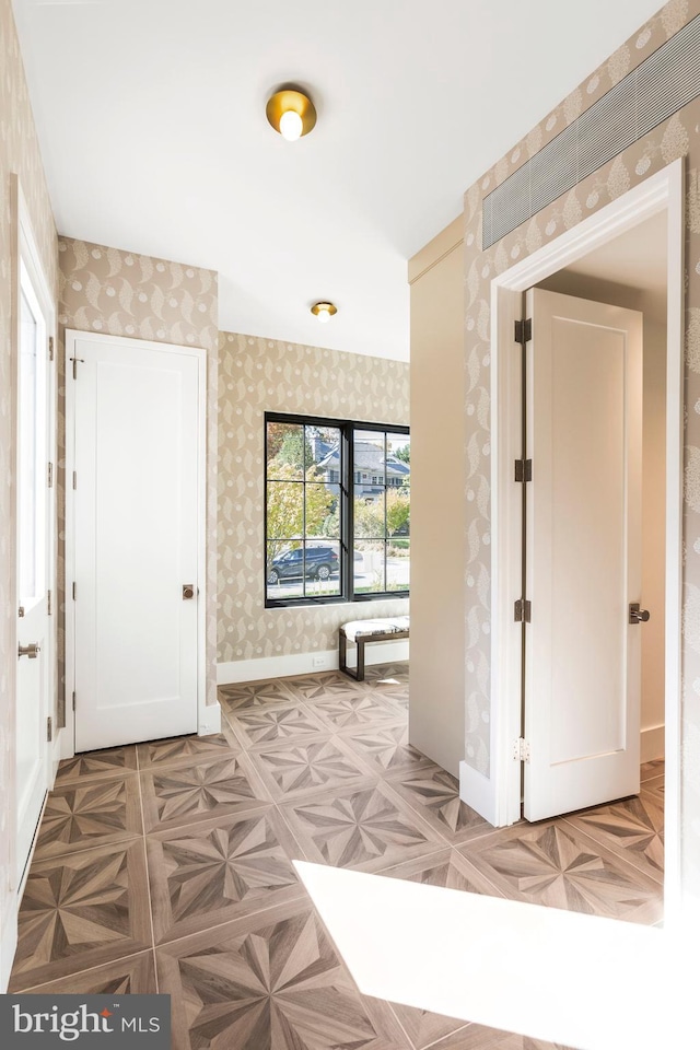 hall featuring light parquet floors