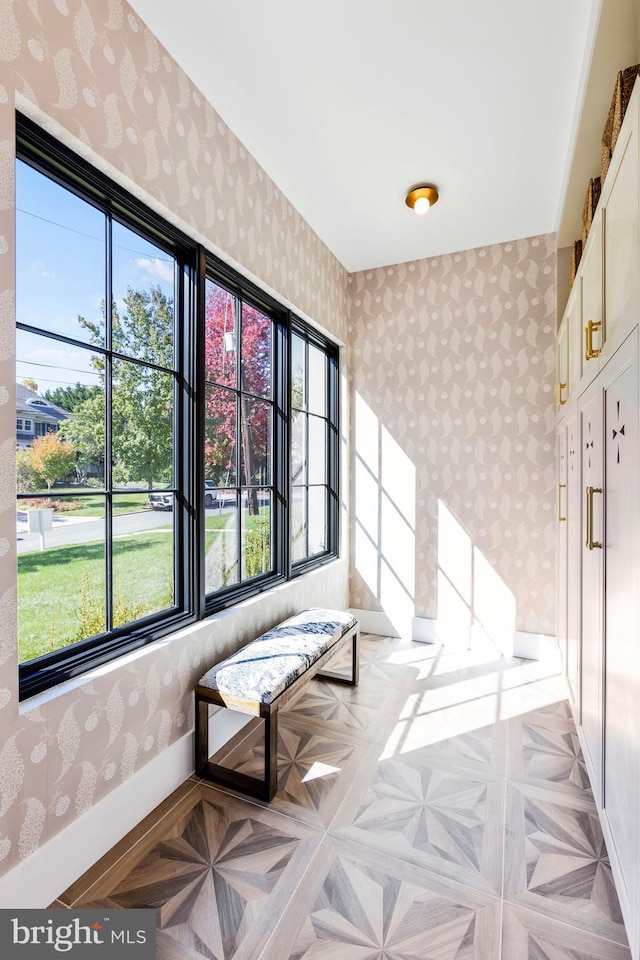 hall with light parquet floors