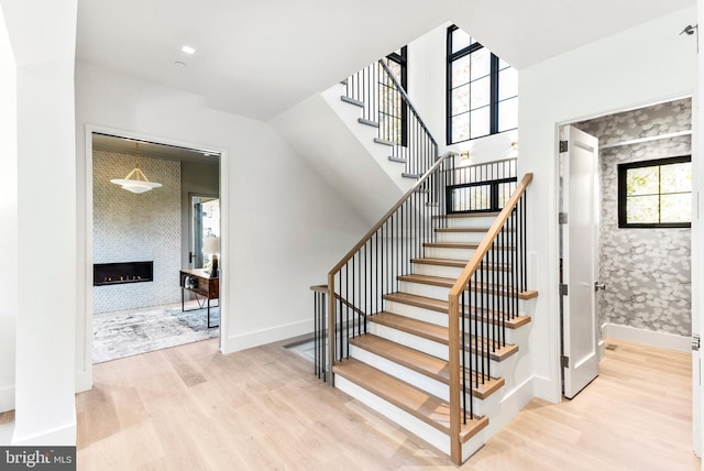 stairway featuring hardwood / wood-style floors