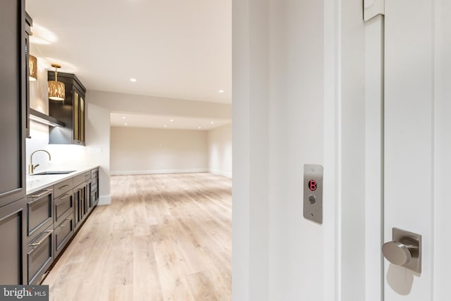 bathroom with vanity and hardwood / wood-style flooring