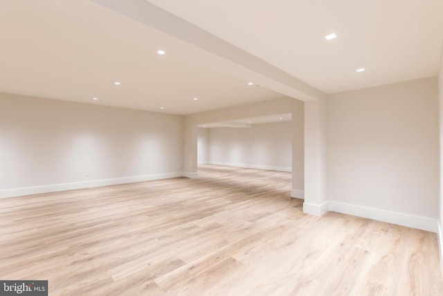 spare room featuring light wood-type flooring