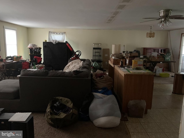 living room featuring ceiling fan