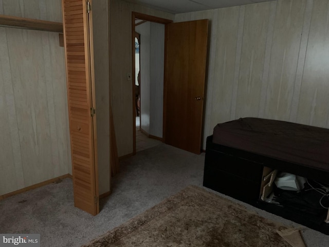 carpeted bedroom featuring a closet