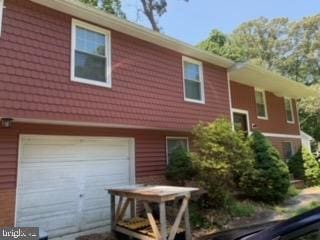 view of home's exterior featuring a garage