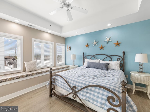 bedroom featuring ceiling fan and light wood-type flooring